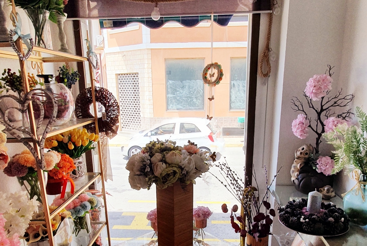 Inside looking out with flower stand in picture. Florists for sale Costa Blanca