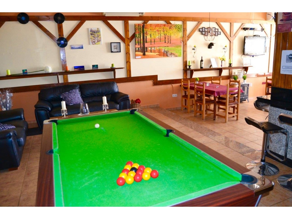 Games area with a pool table